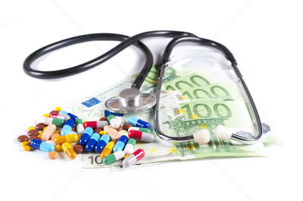 Egészségügy tabletták pénz üzlet orvosi egészség Stock fotó © badmanproduction