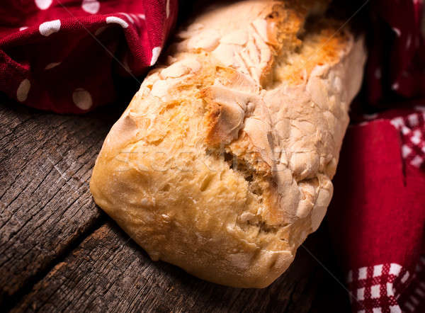 Egész kenyér hagyományos házi asztal textúra Stock fotó © badmanproduction