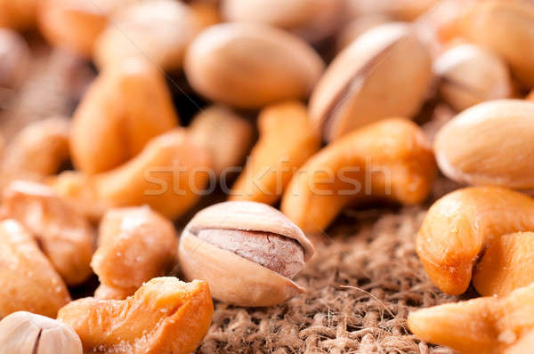 Salted pistachio and cashew nuts Stock photo © badmanproduction