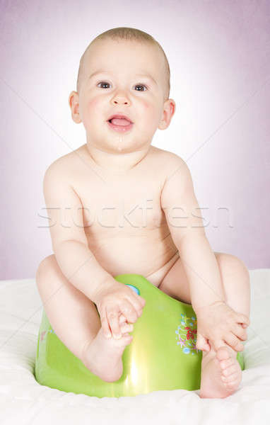 Baby on potty Stock photo © badmanproduction