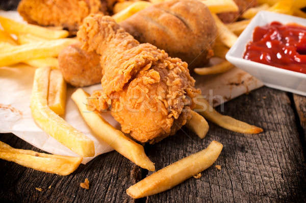 Stock fotó: Egészségtelen · étel · mély · sültcsirke · láb · sültkrumpli · asztal