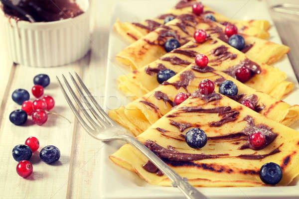 Sweet pancakes and fruit Stock photo © badmanproduction