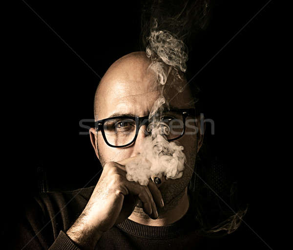 Smoking man Stock photo © badmanproduction
