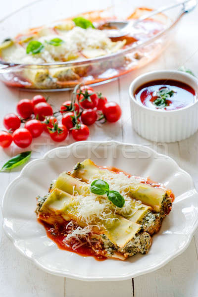 Cannoli with spinach and cheese Stock photo © badmanproduction