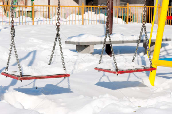 Swings at winter Stock photo © badmanproduction