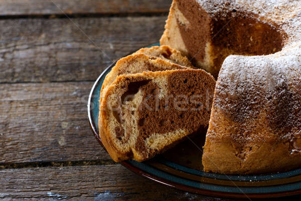 Marble cake in plate Stock photo © badmanproduction