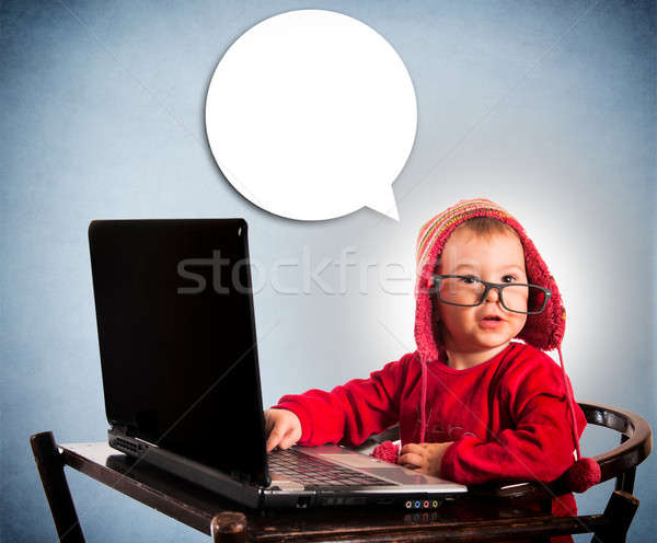 Child with laptop computer Stock photo © badmanproduction
