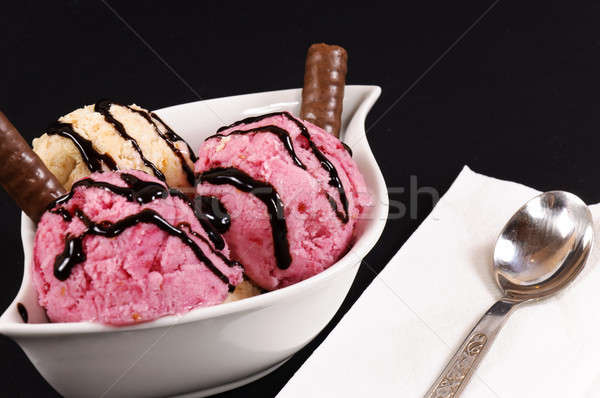 Ice cream on black background Stock photo © badmanproduction