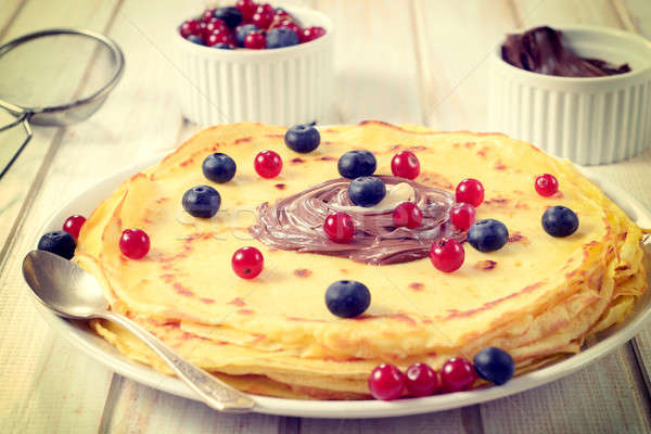 Pancakes and berry fruit Stock photo © badmanproduction