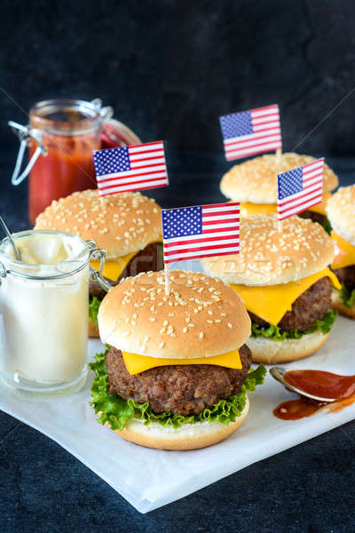 Mini cheeseburgers Stock photo © badmanproduction