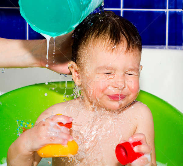 Fürdőkád idő anya csobbanás víz gyermek Stock fotó © badmanproduction