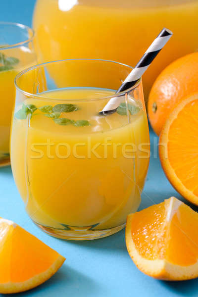 Glas sinaasappelsap selectieve aandacht vers vruchten Stockfoto © badmanproduction