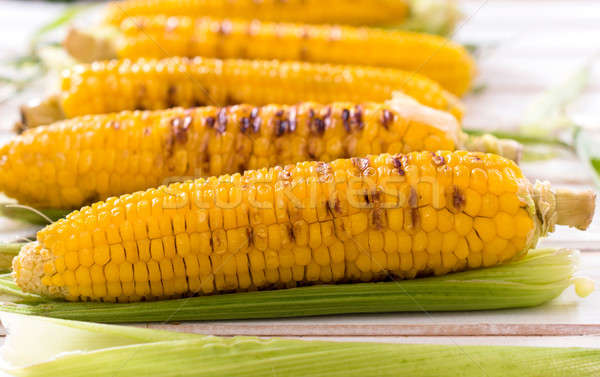 Grilled young corns Stock photo © badmanproduction