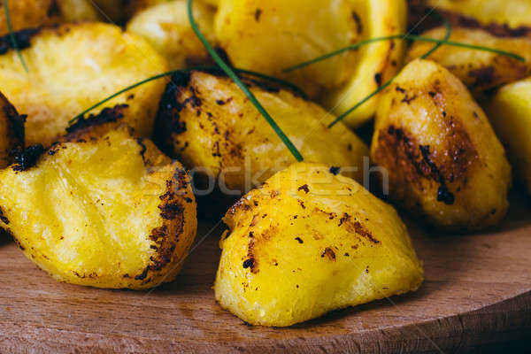 Baked potatoes Stock photo © badmanproduction