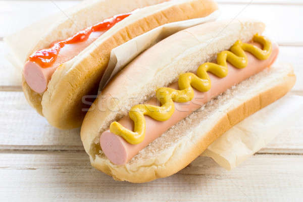 Quente cães mostarda ketchup comida Foto stock © badmanproduction