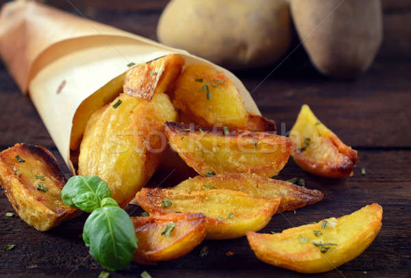 Baked potatoes Stock photo © badmanproduction