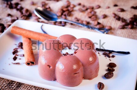 édes puding csokoládé desszert fehér tányér Stock fotó © badmanproduction