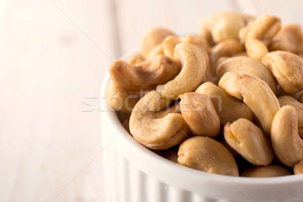Cashew nuts close up Stock photo © badmanproduction