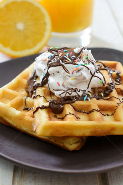 Sweet waffels with cream and chocolate Stock photo © badmanproduction