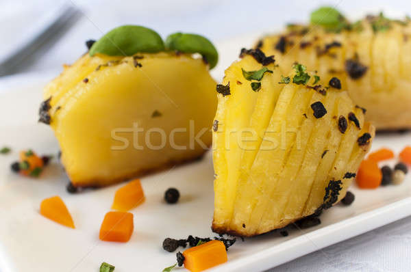 Baked potato Stock photo © badmanproduction