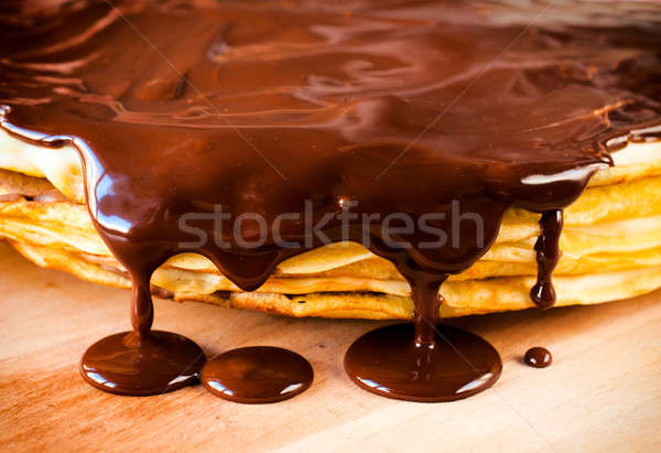 Csokoládé olvad étcsokoládé felső palacsinta hullámok Stock fotó © badmanproduction