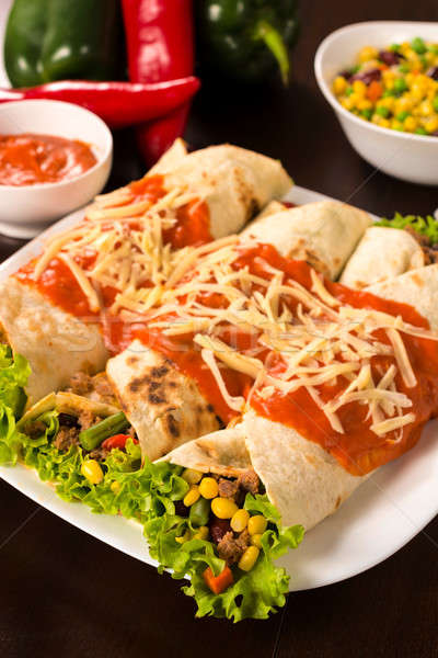 Burritos in plate Stock photo © badmanproduction