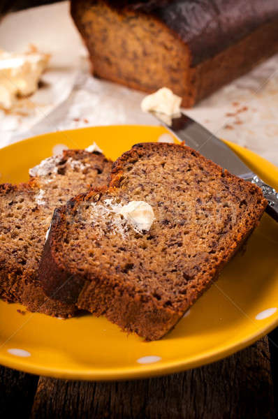Banana bread and butter on plate Stock photo © badmanproduction