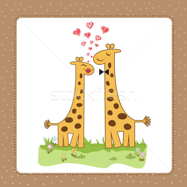 Funny giraffe couple in love Stock photo © balasoiu