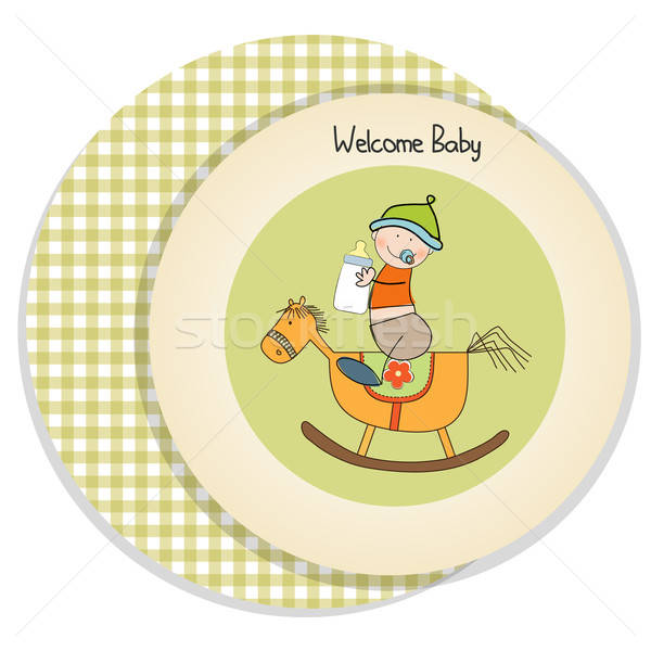 Stock photo: baby boy shower shower with wood horse toy