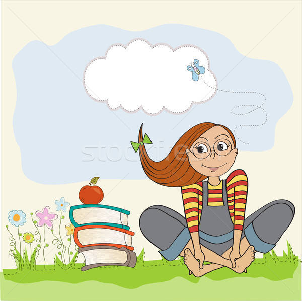 Dziewczyna posiedzenia boso trawy kobieta książki Zdjęcia stock © balasoiu