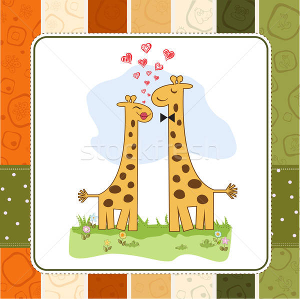 Funny giraffe couple in love Stock photo © balasoiu
