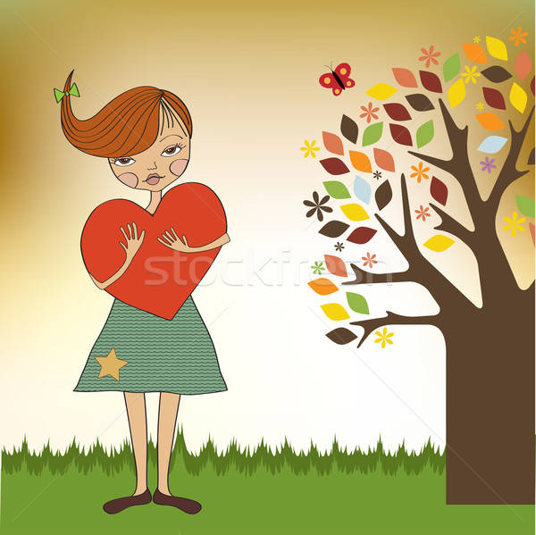 romantic young girl with big heart Stock photo © balasoiu