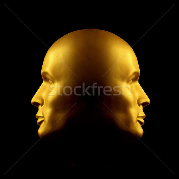 Two-faced gold head statue Stock photo © Balefire9