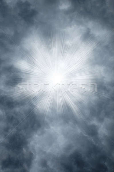 Godly rays shining through clouds Stock photo © Balefire9