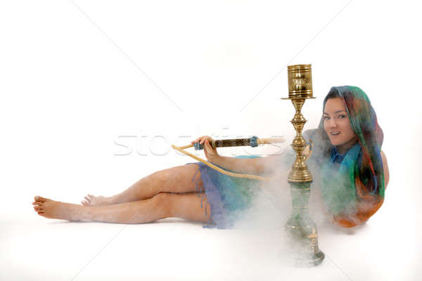Mulher fumador água tubo mulheres feliz Foto stock © Bananna