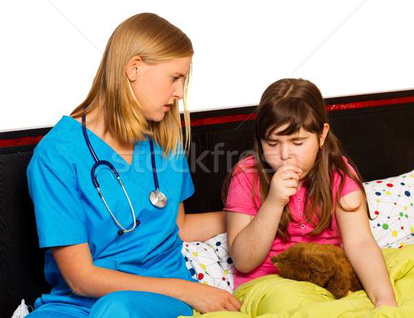 Piccolo paziente tossire medico ragazza Foto d'archivio © barabasa