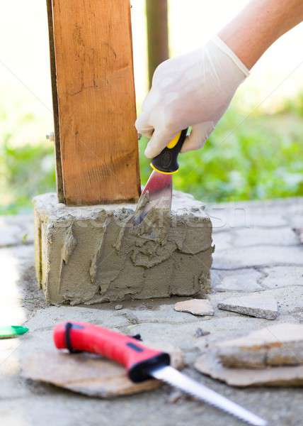 With glue will fix stones well Stock photo © barabasa