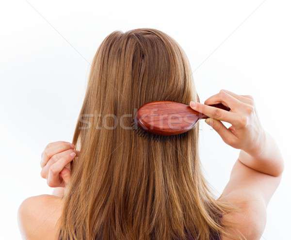 Kadın güzel sağlıklı saç fırçalamak Stok fotoğraf © barabasa