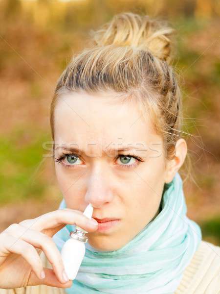 Using nasal spray Stock photo © barabasa