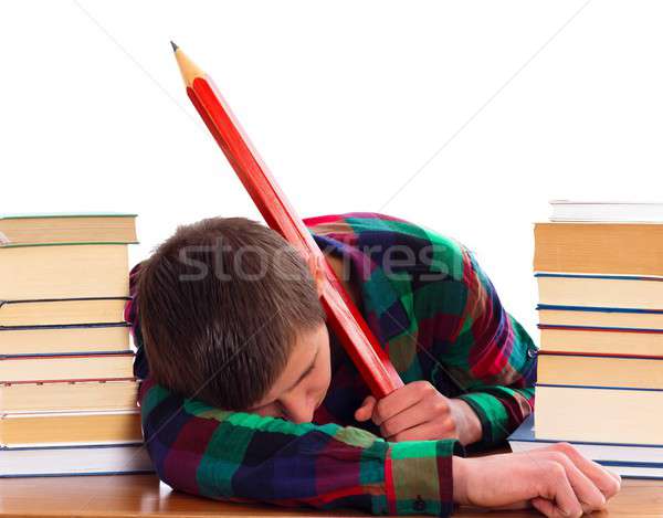 Educación aburrido estudiante papel libros escritorio Foto stock © barabasa