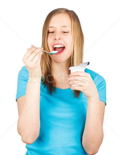 Saine produit laitier s'adapter belle femme manger yaourt Photo stock © barabasa