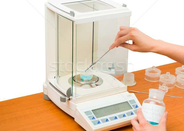 Pharmacist Measuring Substance Stock photo © barabasa