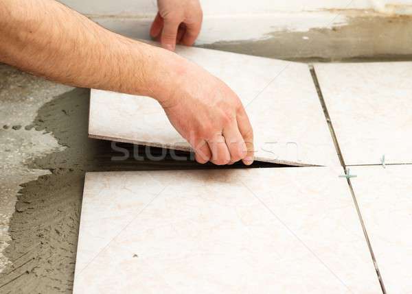 Tiling Works Stock photo © barabasa