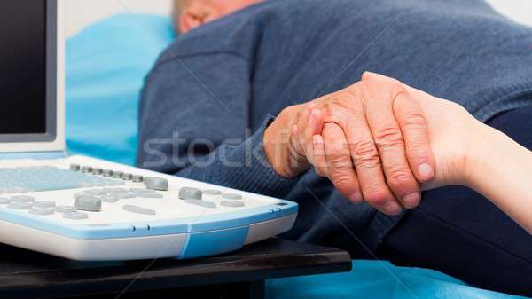 Gondoskodó öreg beteg beteg közelkép idős Stock fotó © barabasa