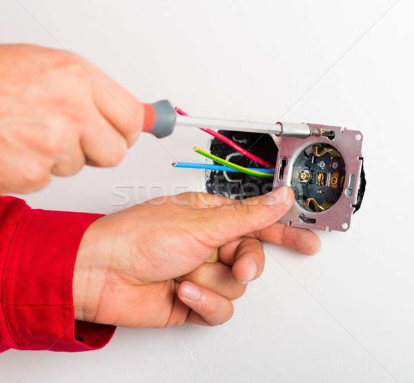 Assembling Electrical Wall Socket Stock photo © barabasa