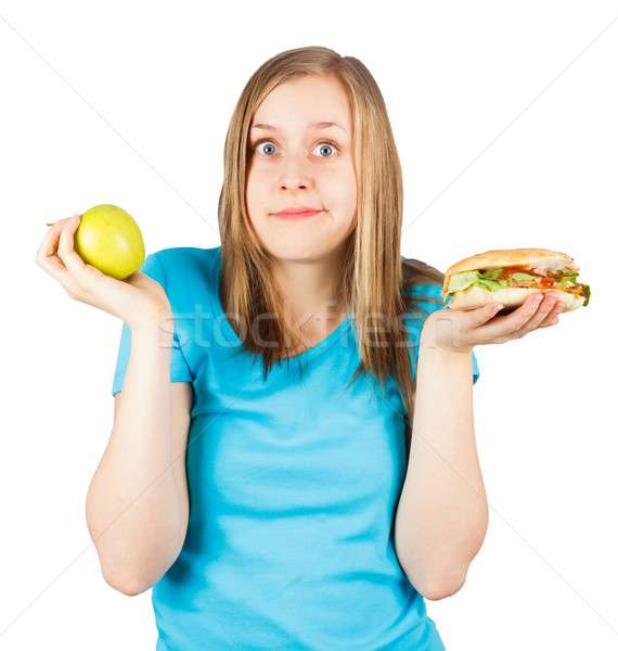 Tentation donner up régime alimentaire temps femme Photo stock © barabasa