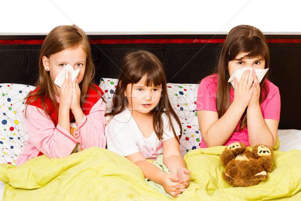 Little Girls With Flu Stock photo © barabasa