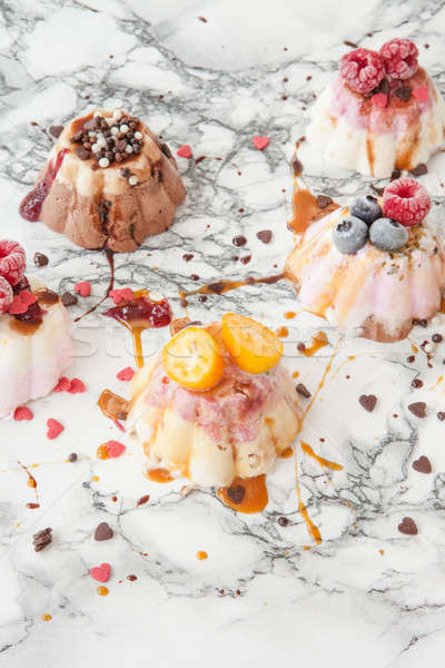 Stock photo: Ice cream cakes with toppings