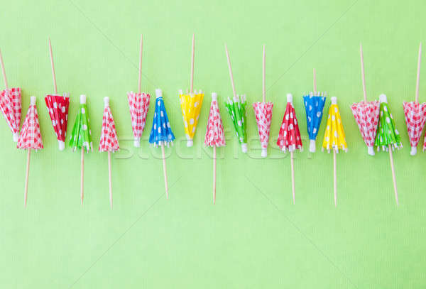 Cocktail umbrellas on Green Stock photo © BarbaraNeveu