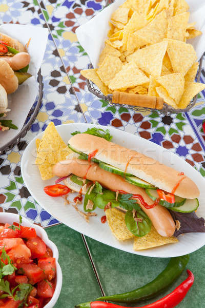 Stock photo: Fresh hot dogs with tortilla chips